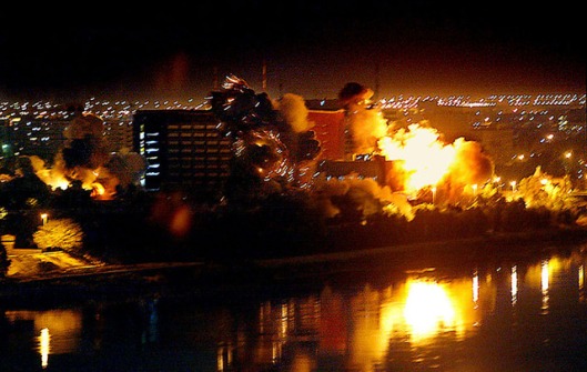 Bombs fall on government buildings along the Tigris River in the heart of Baghdad, later referred to as the Green Zone.